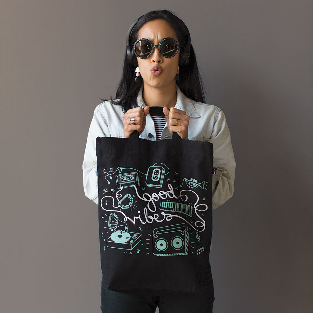 Woman with Tote Team Good Vibes