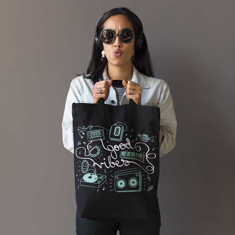 Woman with Tote Team Good Vibes