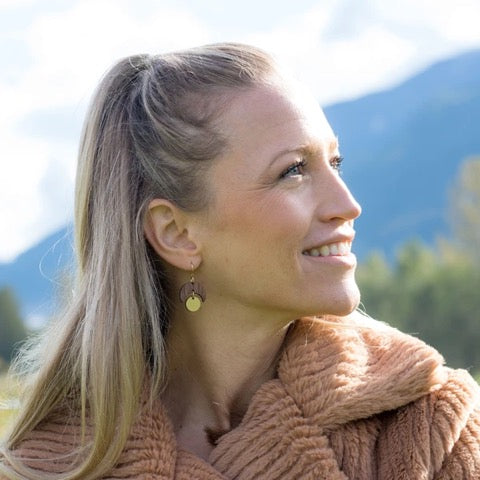 Woman wearing Imuna Earrings - Gold